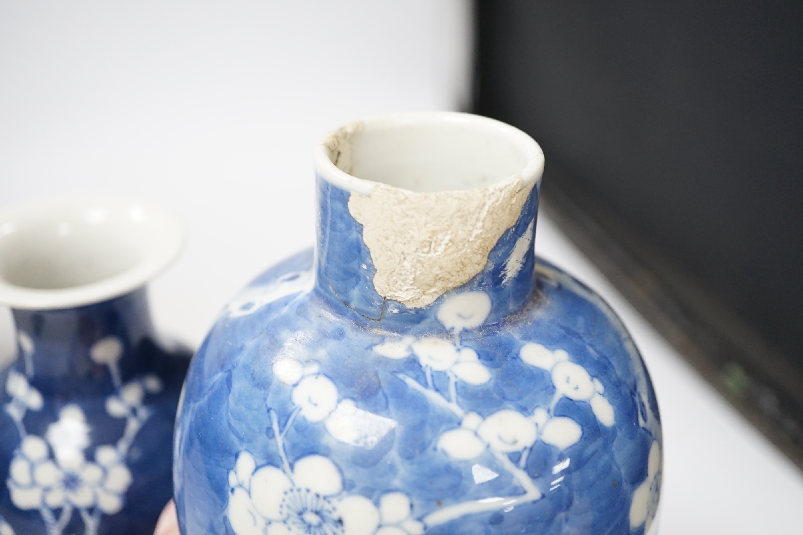 Two Chinese prunus jars and two vases, early 20th century, tallest 26cm